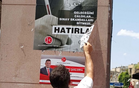 Polisler MHP afişlerini söktü